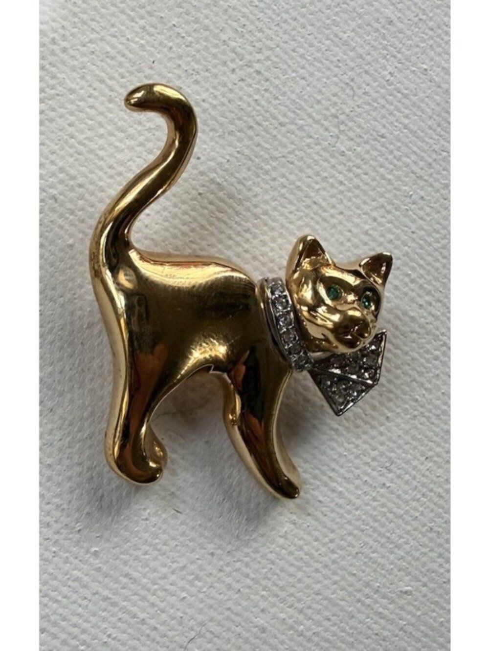 Vintage Butler & Wilson Gold-Tone Cat Brooch with Bow Tie & Emerald Eyes